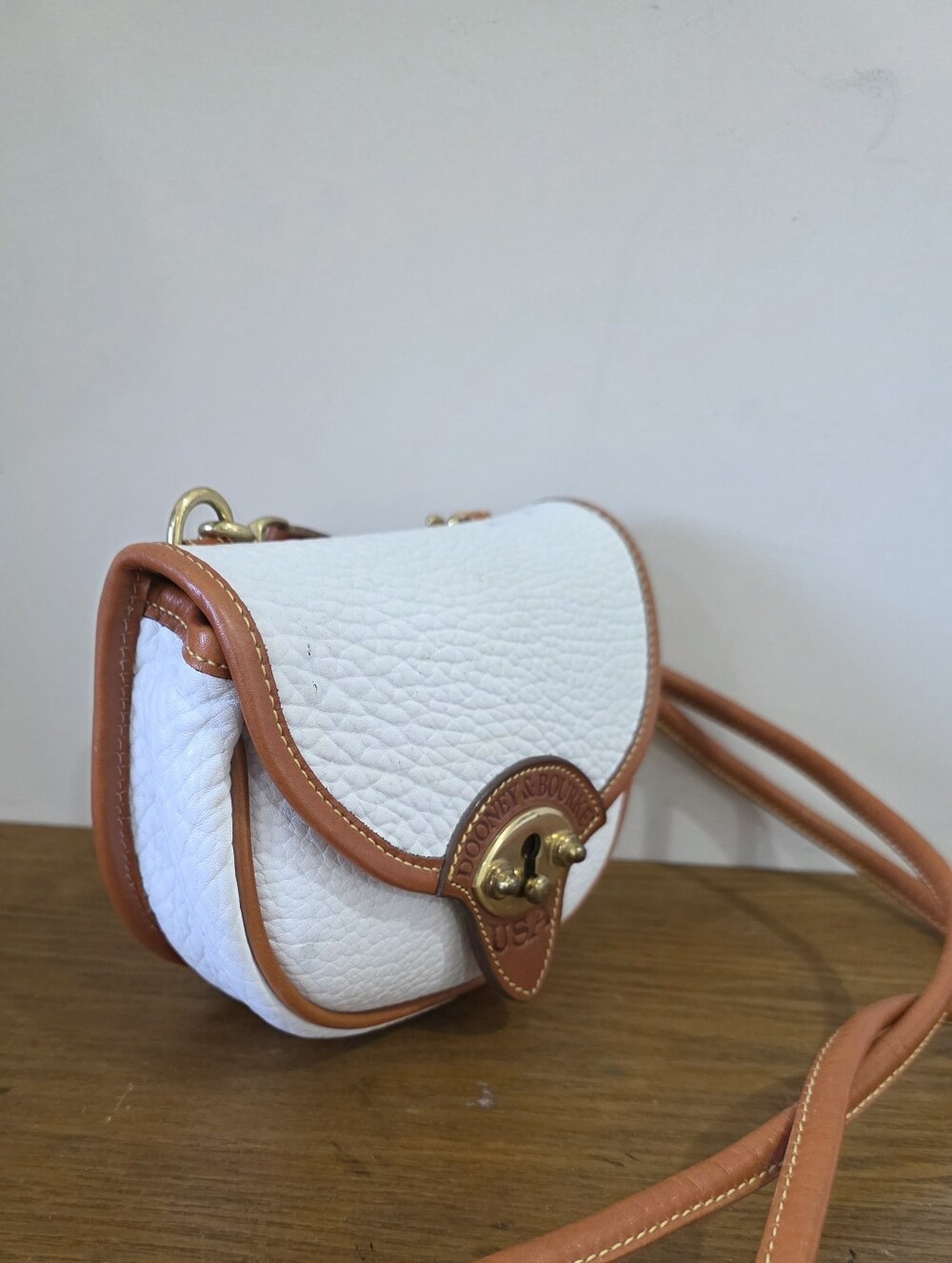 Vintage Dooney and bourke MIni white Pebbled Leather/ Tan trim Crossbody bag